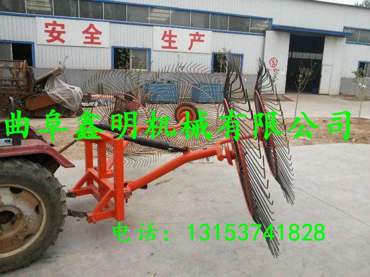 供應(yīng)拖拉機帶雜草摟草機型號 鑫明山地專用牧草摟草機價格
