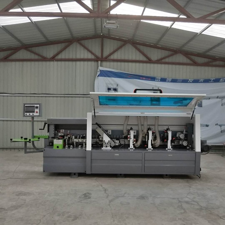 全自動封邊機(jī)木工直線封邊機(jī)鴻鑫三友終身質(zhì)保