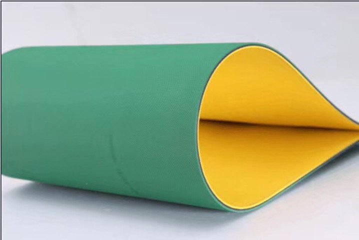黃綠片基平皮帶包裝機械高速耐磨抗靜電尼龍工業(yè)平面?zhèn)鲃虞斔蛶? title=