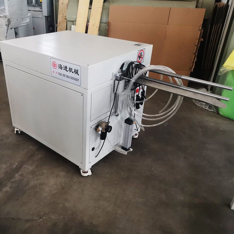 海進機械自動卷被機整條被子打卷縮小體積并套袋