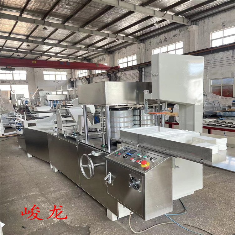峻龍高效生產(chǎn)300型一次性毛巾機做足浴巾擦拭布洗腳布的機器